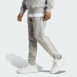 ESSENTIALS FRENCH TERRY TAPERED CUFF 3-STRIPES PANTS