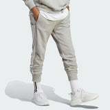 ESSENTIALS FRENCH TERRY TAPERED CUFF 3-STRIPES PANTS